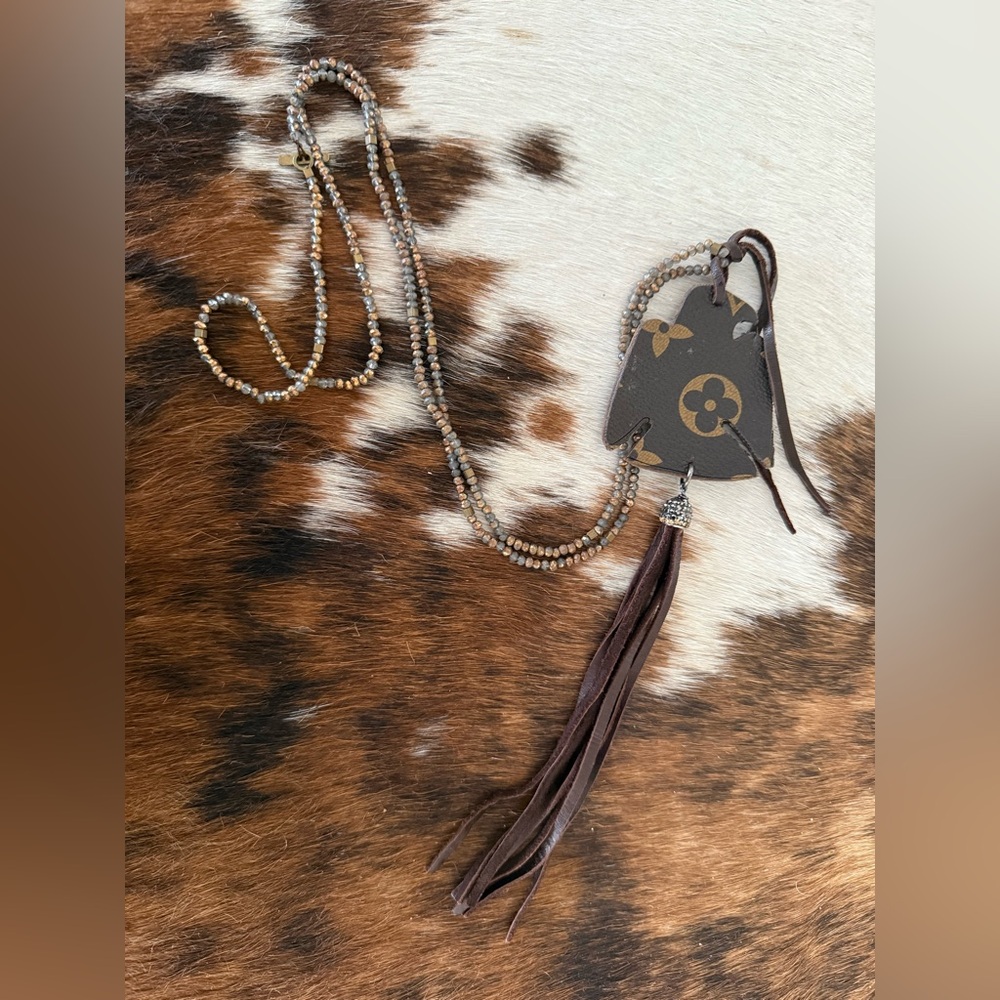 NWOT Keep It Gypsy Metallic Seed Bead Thunderbird Cowhide Leather Necklace